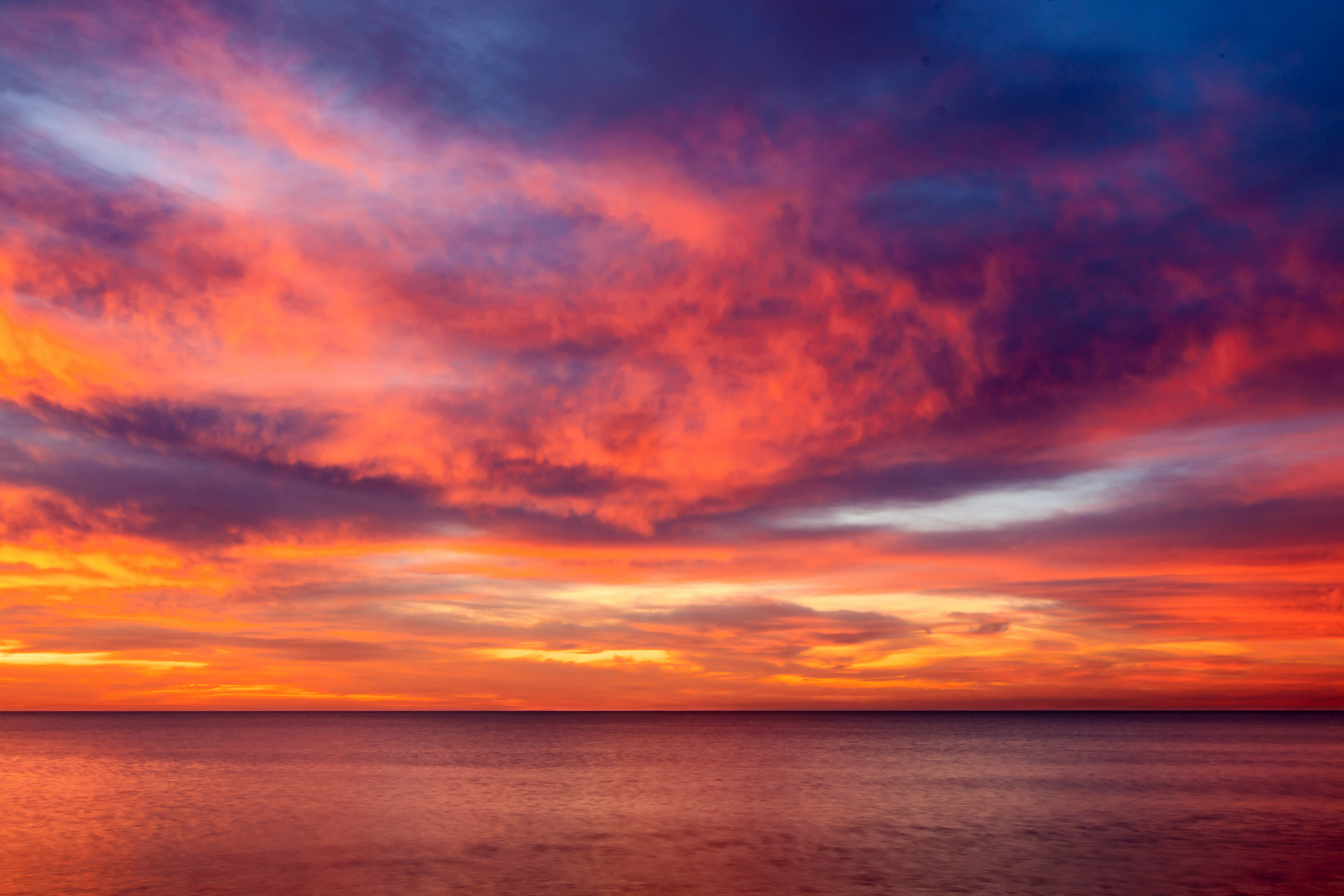 calm of sea during golden hour